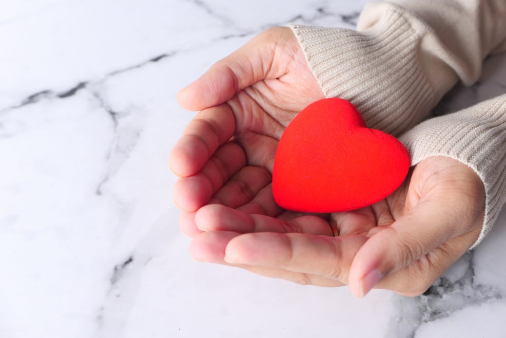 Women Holding Red Heart Close up